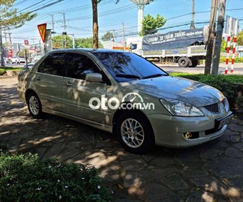 Mitsubishi Lancer  GLX 2005 - Bán Mitsubishi Lancer GLX năm sản xuất 2005, màu bạc số tự động