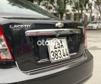 Chevrolet Lacetti   1.6MT 2011 - Bán Chevrolet Lacetti 1.6MT sản xuất 2011, màu đen, giá tốt