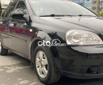 Chevrolet Lacetti   1.6MT 2011 - Bán Chevrolet Lacetti 1.6MT sản xuất 2011, màu đen, giá tốt