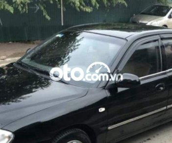 Kia Spectra    2004 - Xe Kia Spectra sản xuất 2004, màu đen