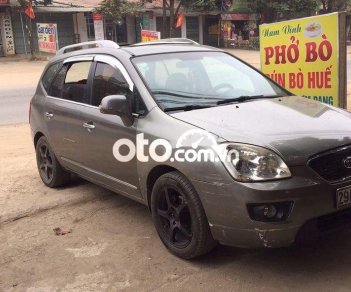 Kia Carens    2.0MT 2011 - Cần bán gấp Kia Carens 2.0MT sản xuất năm 2011, màu xám còn mới