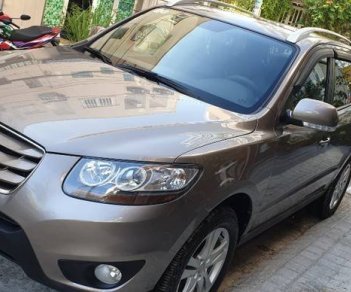 Hyundai Santa Fe MLX 2009 - Cần bán lại xe Hyundai Santa Fe MLX năm sản xuất 2009, màu nâu