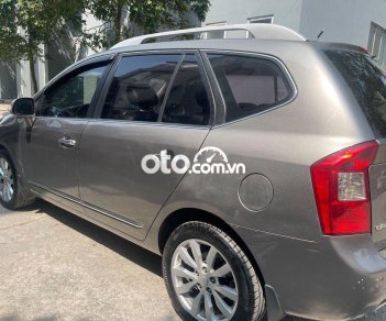 Kia Carens   2.0AT 2012 - Bán ô tô Kia Carens 2.0AT sản xuất năm 2012, màu xám số tự động