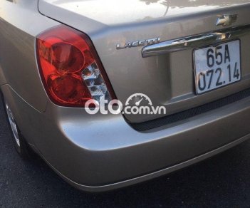 Chevrolet Lacetti 2011 - Cần bán lại xe Chevrolet Lacetti EX 1.6MT 2011, màu vàng