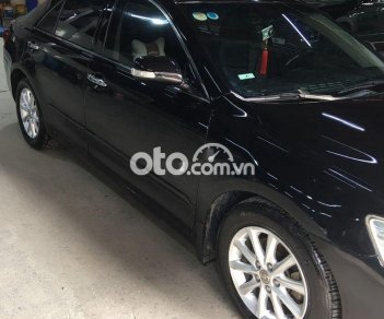 Toyota Camry 2009 - Bán Toyota Camry 2.0E sản xuất năm 2009, màu đen, nhập khẩu nguyên chiếc 