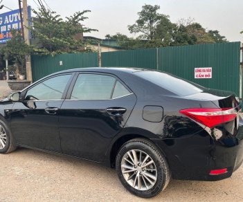 Toyota Corolla 2015 - Cần bán gấp Toyota Corolla 1.8G năm sản xuất 2015, màu đen, giá chỉ 543 triệu