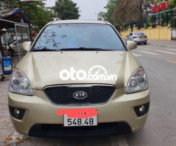 Kia Carens 2012 - Bán ô tô Kia Carens sản xuất 2012, màu vàng