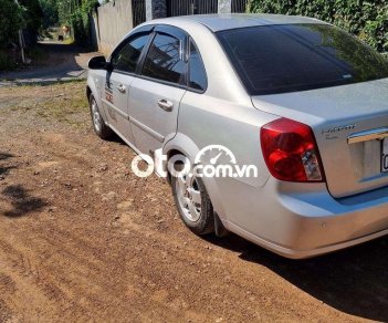 Chevrolet Lacetti 2012 - Cần bán gấp Chevrolet Lacetti EX 1.6MT năm 2012, màu bạc số sàn giá cạnh tranh