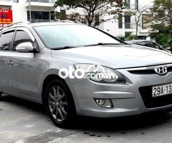 Hyundai i30 2010 - Cần bán xe Hyundai i30 AT sản xuất 2010, màu bạc, nhập khẩu nguyên chiếc