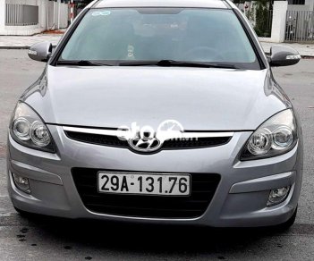 Hyundai i30 2010 - Cần bán xe Hyundai i30 AT sản xuất 2010, màu bạc, nhập khẩu nguyên chiếc