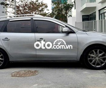 Hyundai i30 2010 - Cần bán xe Hyundai i30 AT sản xuất 2010, màu bạc, nhập khẩu nguyên chiếc