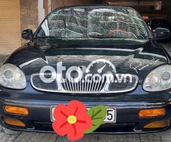 Daewoo Leganza 2002 - Cần bán gấp Daewoo Leganza sản xuất năm 2002, màu đen, xe nhập, 87tr