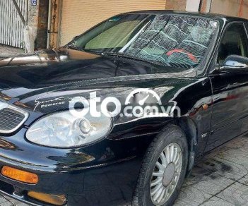 Daewoo Leganza 2002 - Cần bán gấp Daewoo Leganza sản xuất năm 2002, màu đen, xe nhập, 87tr