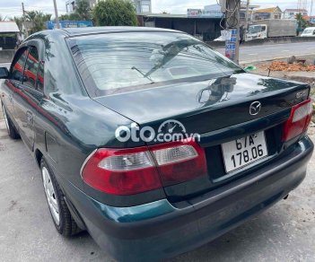 Mazda 626 2003 - Cần bán Mazda 626 MT sản xuất 2003, màu xanh lục giá cạnh tranh