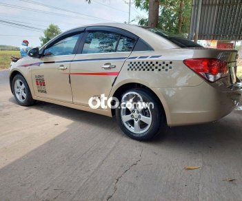 Chevrolet Cruze 2012 - Xe Chevrolet Cruze năm 2012, màu vàng