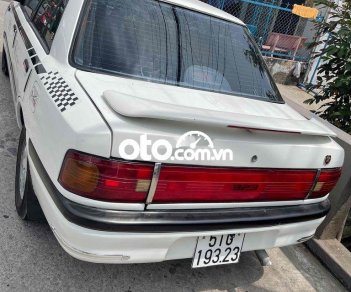 Mazda 323 1995 - Xe Mazda 323 năm 1995, màu trắng, nhập khẩu