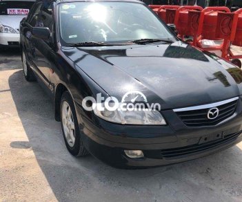 Mazda 626 2003 - Cần bán lại xe Mazda 626 sản xuất năm 2003, màu đen, 159tr