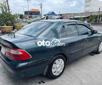 Mazda 626 2003 - Cần bán Mazda 626 MT sản xuất 2003, màu xanh lục giá cạnh tranh