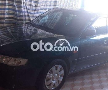 Mazda 626 2001 - Bán ô tô Mazda 626 sản xuất 2001, màu đen 