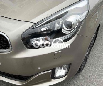 Kia Rondo 2015 - Bán Kia Rondo sản xuất năm 2015, màu vàng, giá 495tr