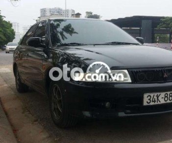 Mitsubishi Lancer 2002 - Bán Mitsubishi Lancer sản xuất năm 2002, màu đen, xe nhập, giá 85tr