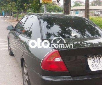 Mitsubishi Lancer 2002 - Bán Mitsubishi Lancer sản xuất năm 2002, màu đen, xe nhập, giá 85tr