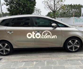 Kia Rondo 2015 - Bán Kia Rondo sản xuất năm 2015, màu vàng, giá 495tr