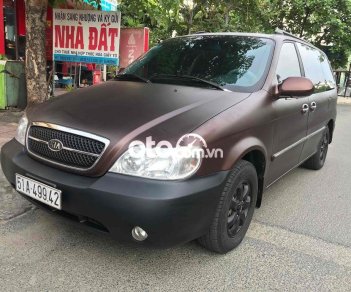 Kia Carnival 2009 - Xe Kia Carnival năm sản xuất 2009, màu nâu, nhập khẩu 