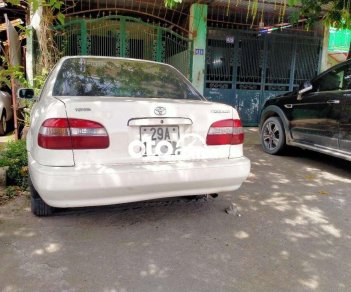 Toyota Corolla 1998 - Bán Toyota Corolla MT sản xuất năm 1998, màu kem (be), giá tốt