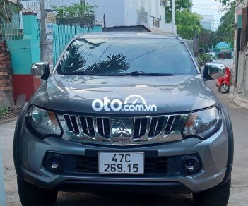 Mitsubishi Triton 2015 - Bán Mitsubishi Triton sản xuất 2015, màu xám, xe nhập số sàn, 415 triệu