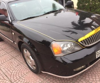 Daewoo Magnus 2004 - Bán ô tô Daewoo Magnus sản xuất năm 2004, màu đen 