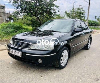 Ford Laser 2004 - Bán ô tô Ford Laser sản xuất 2004, màu đen, 157 triệu