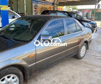 Ford Laser 2001 - Cần bán xe Ford Laser MT sản xuất 2001, màu nâu, nhập khẩu