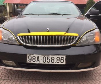 Daewoo Magnus 2004 - Bán ô tô Daewoo Magnus sản xuất năm 2004, màu đen 