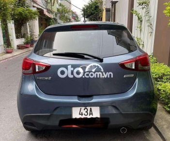 Mazda 2 2016 - Bán xe Mazda 2 1.5AT sản xuất năm 2016, màu xanh lam mới chạy 45.000 km