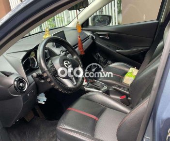 Mazda 2 2016 - Bán xe Mazda 2 1.5AT sản xuất năm 2016, màu xanh lam mới chạy 45.000 km