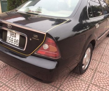 Daewoo Magnus 2004 - Bán ô tô Daewoo Magnus sản xuất năm 2004, màu đen 