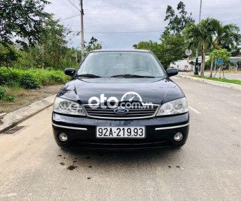 Ford Laser 2004 - Bán ô tô Ford Laser sản xuất 2004, màu đen, 157 triệu