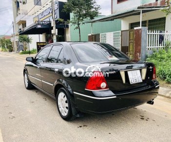 Ford Laser 2004 - Bán ô tô Ford Laser sản xuất 2004, màu đen, 157 triệu