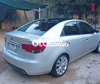 Kia Forte 2012 - Cần bán gấp Kia Forte sản xuất 2012, màu bạc