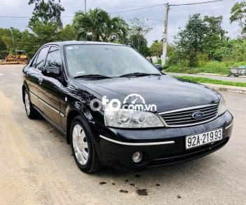 Ford Laser 2004 - Bán ô tô Ford Laser sản xuất 2004, màu đen, 157 triệu