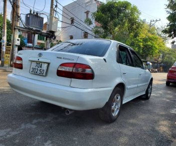 Toyota Corolla 2000 - Cần bán Toyota Corolla 1.6 GLi sản xuất năm 2000, màu trắng 