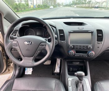 Kia K3 2014 - Bán Kia K3 1.6AT sản xuất năm 2014, màu vàng cát số tự động, 465 triệu