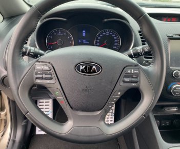 Kia K3 2014 - Bán Kia K3 1.6AT sản xuất năm 2014, màu vàng cát số tự động, 465 triệu