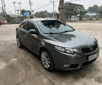 Kia Cerato 2009 - Bán Kia Cerato 1.6 số tự động sản xuất 2009, màu xám