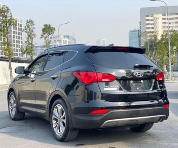 Hyundai Santa Fe 2015 - Cần bán lại xe Hyundai Santa Fe 2.4L máy xăng 2015, màu đen, giá 765tr