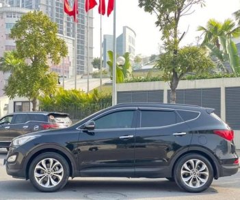 Hyundai Santa Fe 2015 - Cần bán lại xe Hyundai Santa Fe 2.4L máy xăng 2015, màu đen, giá 765tr