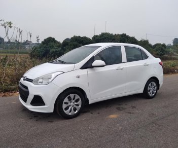 Hyundai Grand i10 2016 - Em cần bán xe Hyundai Grand i10 1.2MT năm sản xuất 2016, màu trắng, nhập khẩu nguyên chiếc, giá cạnh tranh