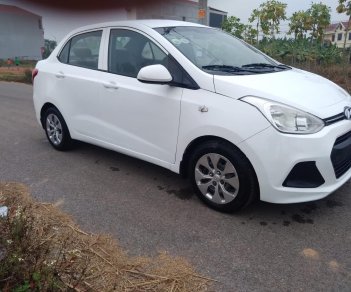 Hyundai Grand i10 2016 - Em cần bán xe Hyundai Grand i10 1.2MT năm sản xuất 2016, màu trắng, nhập khẩu nguyên chiếc, giá cạnh tranh