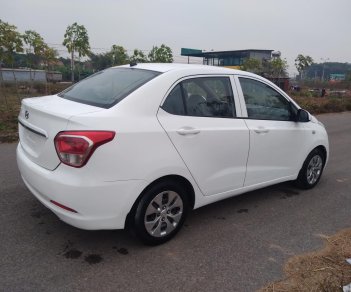 Hyundai Grand i10 2016 - Em cần bán xe Hyundai Grand i10 1.2MT năm sản xuất 2016, màu trắng, nhập khẩu nguyên chiếc, giá cạnh tranh